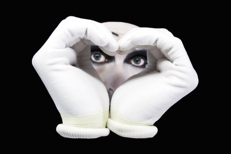 Heart and eyes of  mime on a black backgroundの写真素材