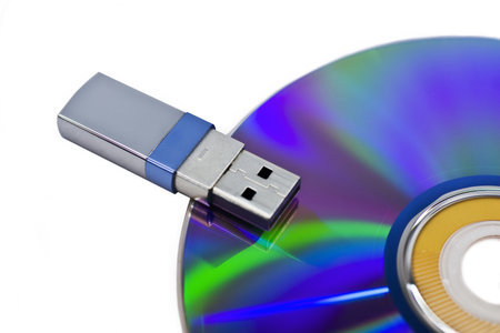 Flash USB whis CD isolated on a white backgroundの写真素材