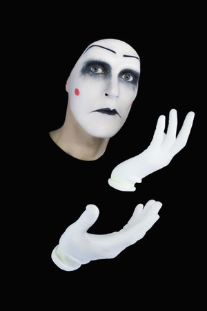 Portrait of the gloomy mime on a black backgroundの写真素材
