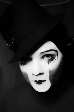 Portrait of the sad mime in a hatの写真素材