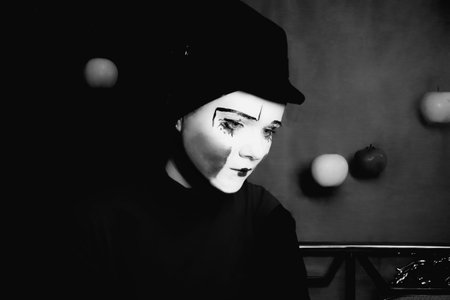 Portrait of the sad mime in a hatの写真素材