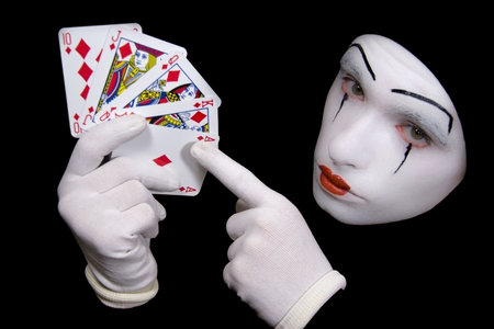 Portrait of  mime with playing cards
