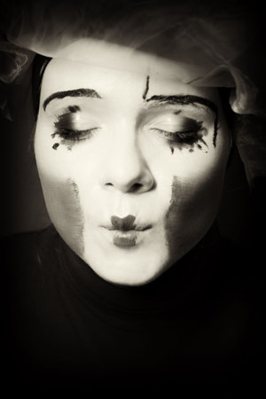 Portrait of the surprise mime in a veilの写真素材