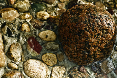 Water flowing in stonesの写真素材