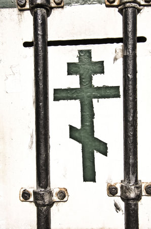 Orthodox cross on a white wallの写真素材