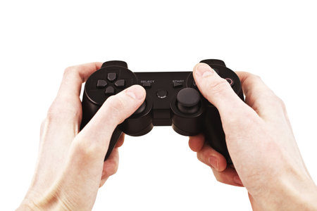 Video game controller in hand isolated on white background