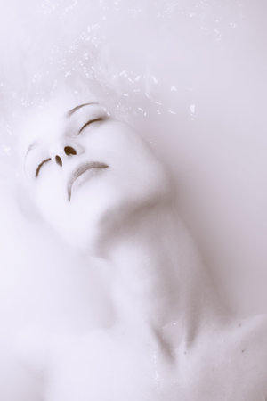 Face beautiful young woman in troubled watersの写真素材