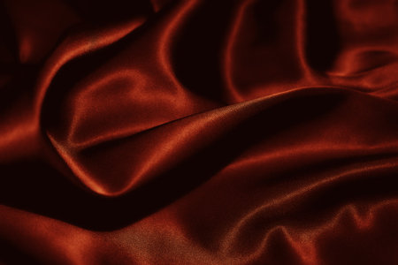 Texture of a red silk closeupの写真素材