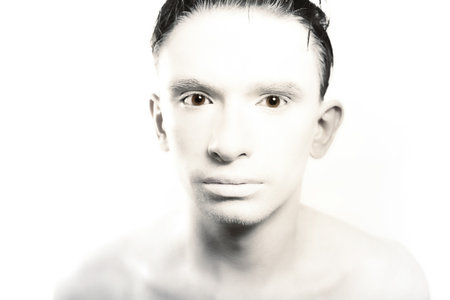 portrait of young brunette man with white skin の写真素材