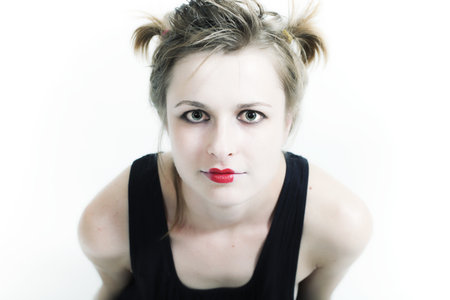 portrait of a young woman with make-up by a little girlの写真素材