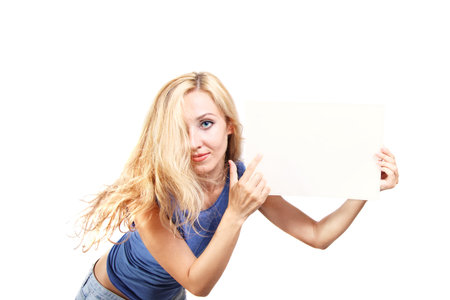 Young beautiful blond woman holding a blank sheet isolated on a white backgroundの写真素材