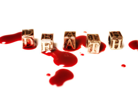 metal word death in drops of blood closeupの写真素材