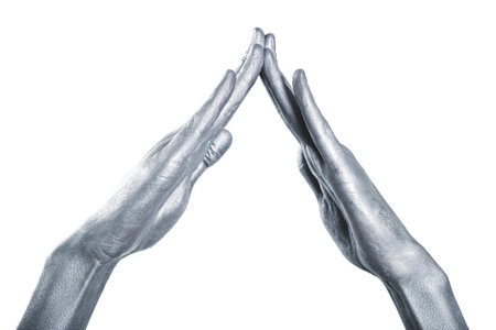 beautiful men metal hands with long fingers on  white backgroundの写真素材