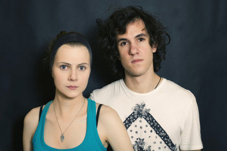 double portrait of young men and women on a black backgroundの写真素材