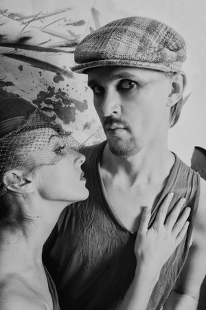 Studio portrait of young men and women in retro styleの写真素材