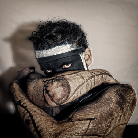 Portrait of  man in  black mask with the insidious lookの写真素材