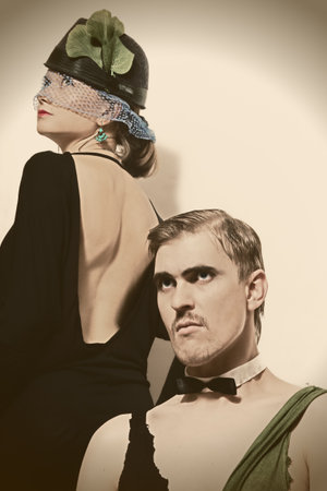 Young couple theater actors in a retro styleの写真素材