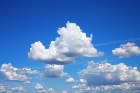 Photo of the sky with fluffy cumulus clouds 