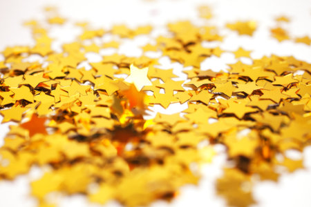 Christmas background with golden stars close-upの写真素材