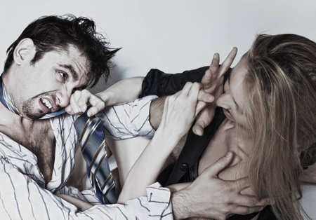 Portrait of young fighting men and women closeupの写真素材
