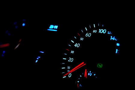 Car dashboard with speedometer, glow in the dark