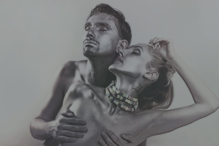 Portrait of Two embracing lovers with silver make-up