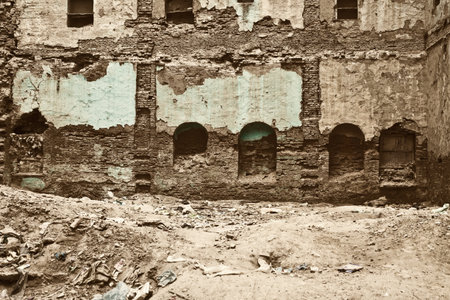 The old ruined brick apartment building