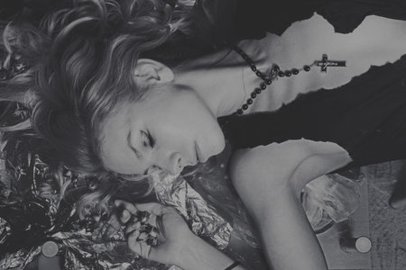 Portrait of a beautiful young woman lying closeupの写真素材