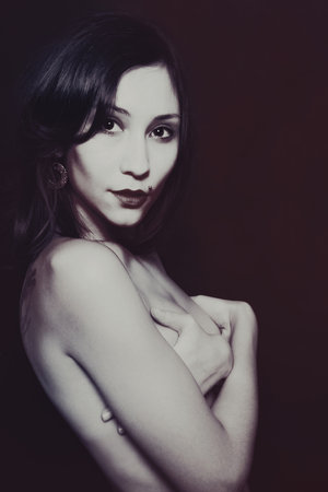 Portrait of a beautiful young brunette womanの写真素材