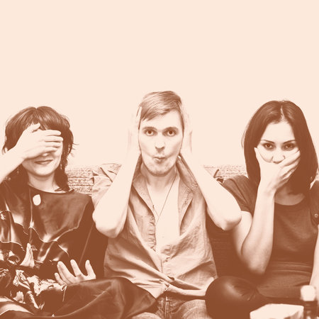 Portrait of three people with closed ears, mouth and eyesの写真素材