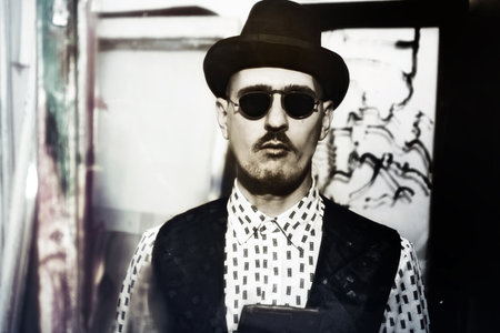 Portrait of a man wearing a stylish sunglasses