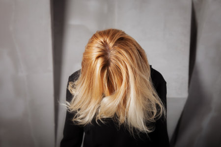 Beautiful healthy dyed blond hair of young womanの写真素材