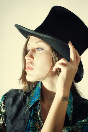 Portrait of  beautiful young girl wearing  topper