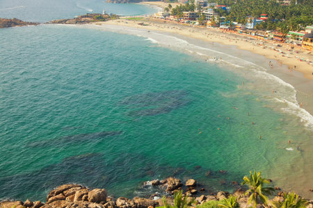 Beautiful landscape of beach and clear turquoise sea. Thiruvananthapuram, Indiaの写真素材
