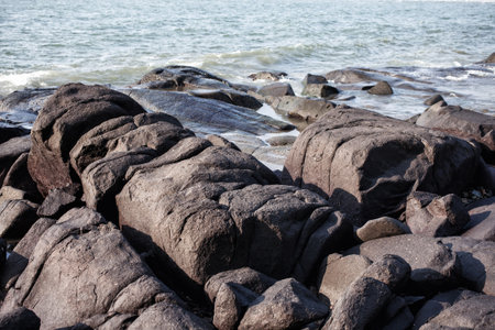 Large boulders on the sea coastの写真素材