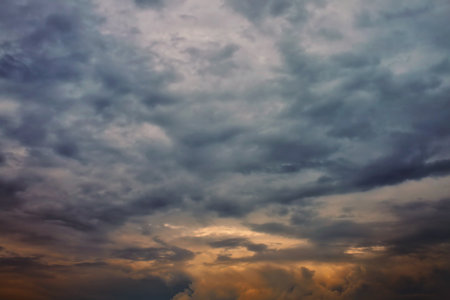 Dramatic cloudy sky with dark storm cloudsの写真素材