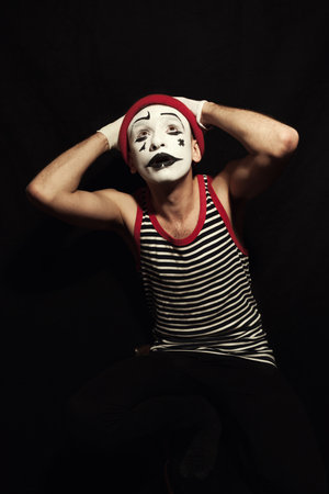 Portrait of actor mime on black backgroundの写真素材