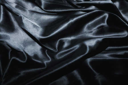 texture of a black silk close upの写真素材
