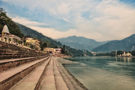 The steps of the ashram at the shore of the sacred river Ganges. India, Rishikeshの写真素材
