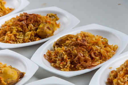 Islamic dish consisting of rice with buried chickenの写真素材