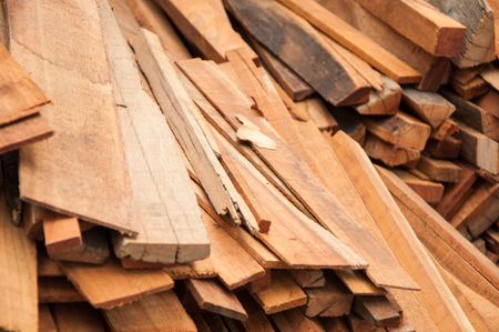 unsystematic brown wood pile in vary sizesの写真素材