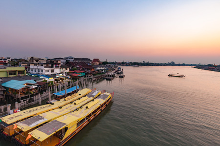 Nonthaburi, THAILAND - April 10: 2016.Sundown with town below Time Pakkret is a small town in the Chao Phraya River. on April 10, 2016 in Nonthaburi Province, Thailand.のeditorial素材