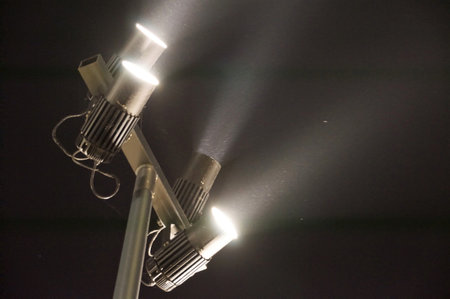 Light beams from spotlights in the fog