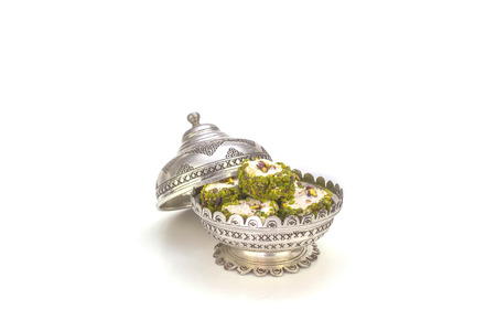 Turkish delight in silver case on white background.の写真素材