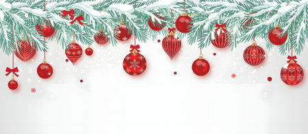 Christmas tree branches with red ornaments and snow, festive holiday decoration, isolated on white backgroundの素材