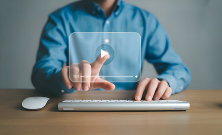 Man touching virtual play button on media player interface, streaming multimedia content online, digital entertainment technology conceptの素材