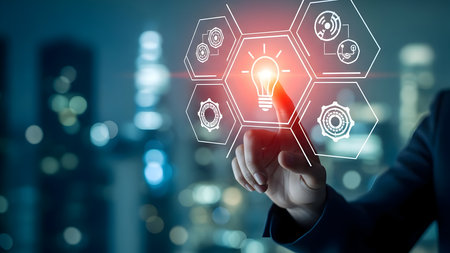 Businessperson touching virtual screen with glowing lightbulb and interconnected icons, representing innovation, idea generation, and future technology solutions.の素材