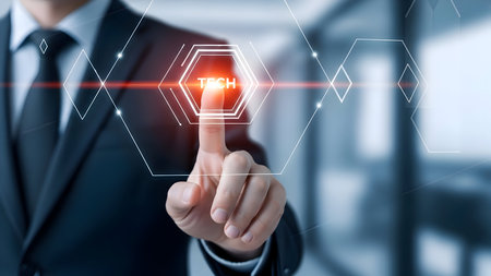 Businessman's finger tapping glowing 'tech' button on a sophisticated virtual interface, representing cutting-edge innovation and digital future.の素材