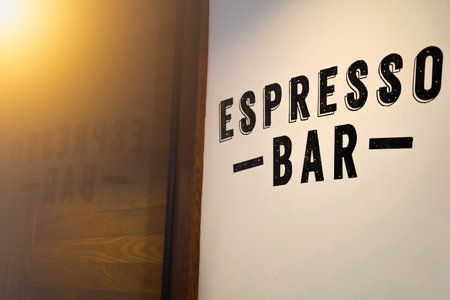 An inscription of a front coffee shop, on a wall cafe font typography, typing espresso bar