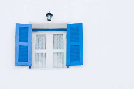 the blue window at santorini chaam from thailandの写真素材